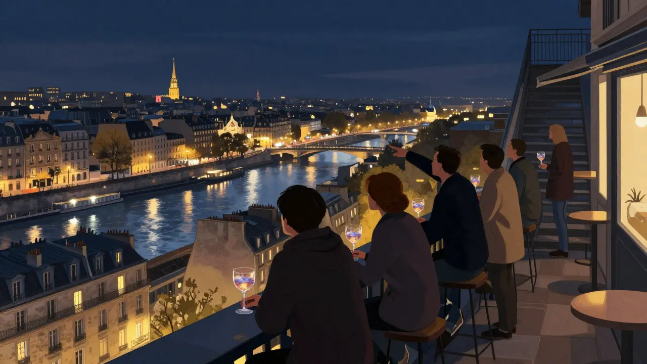 People on a quiet Paris rooftop at night, overlooking the glowing city skyline with the Seine below.