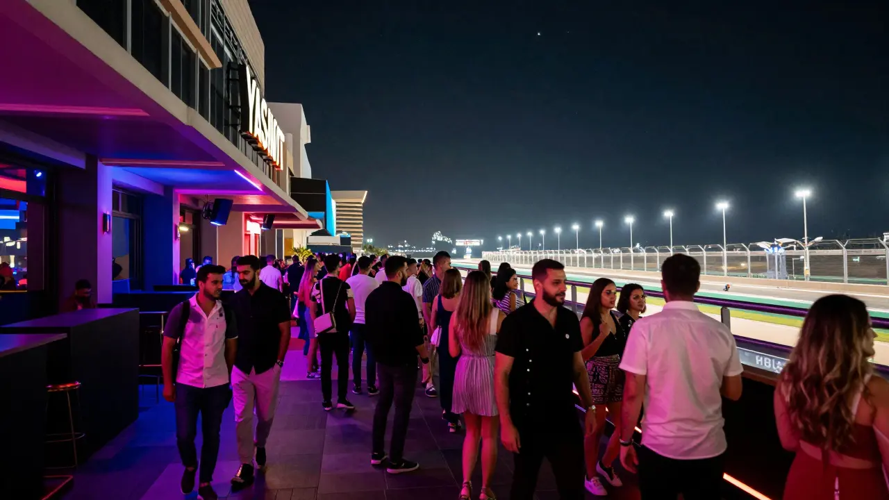 Crowds entering a lively nightclub on Yas Island at night under neon lights.